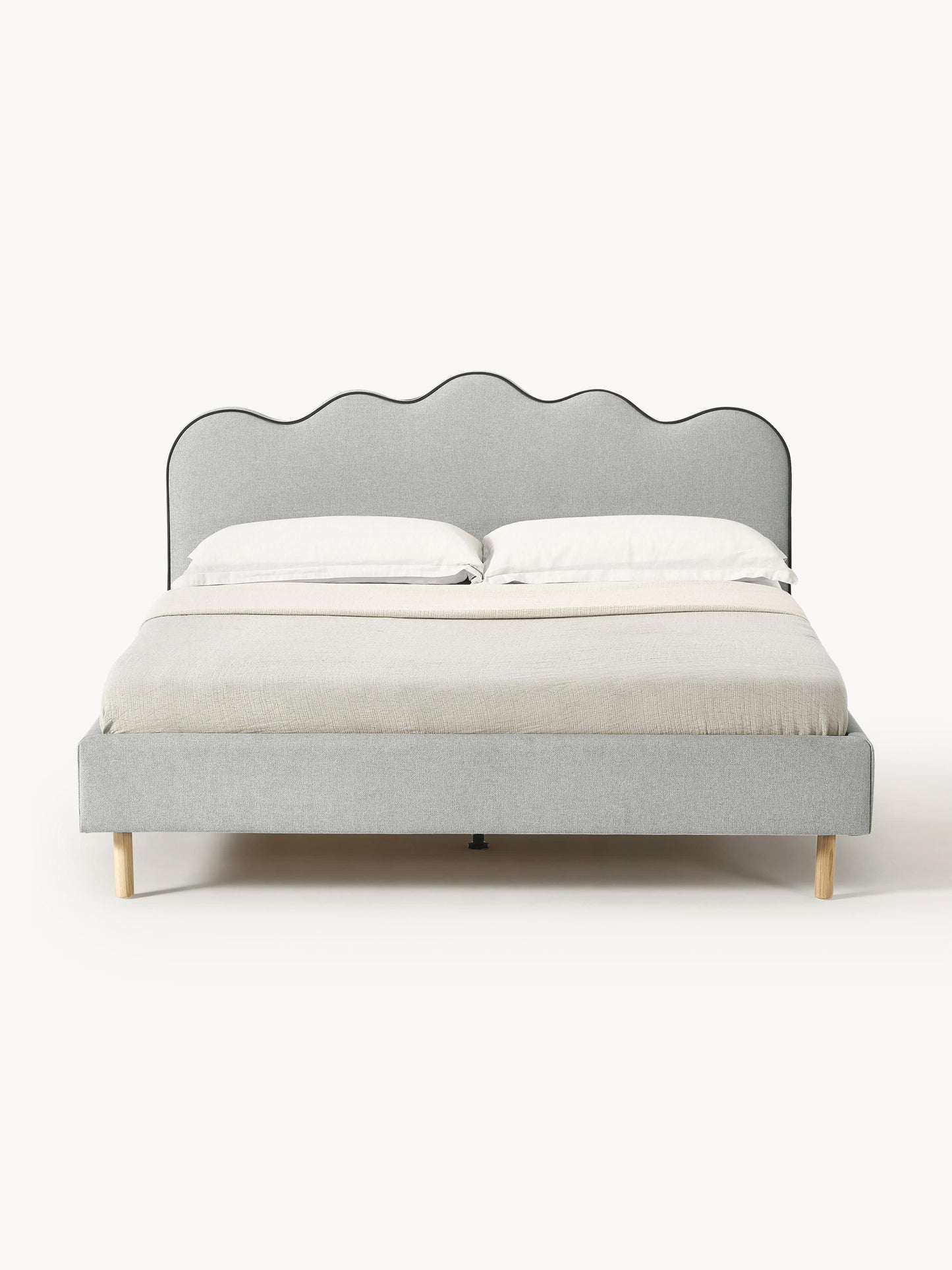 Romy Upholstered Bed with Wavy Headboard