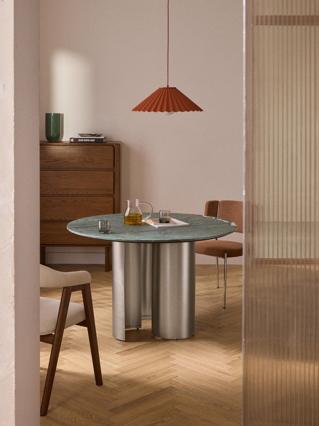 Round marble dining table in a cosy dining room
