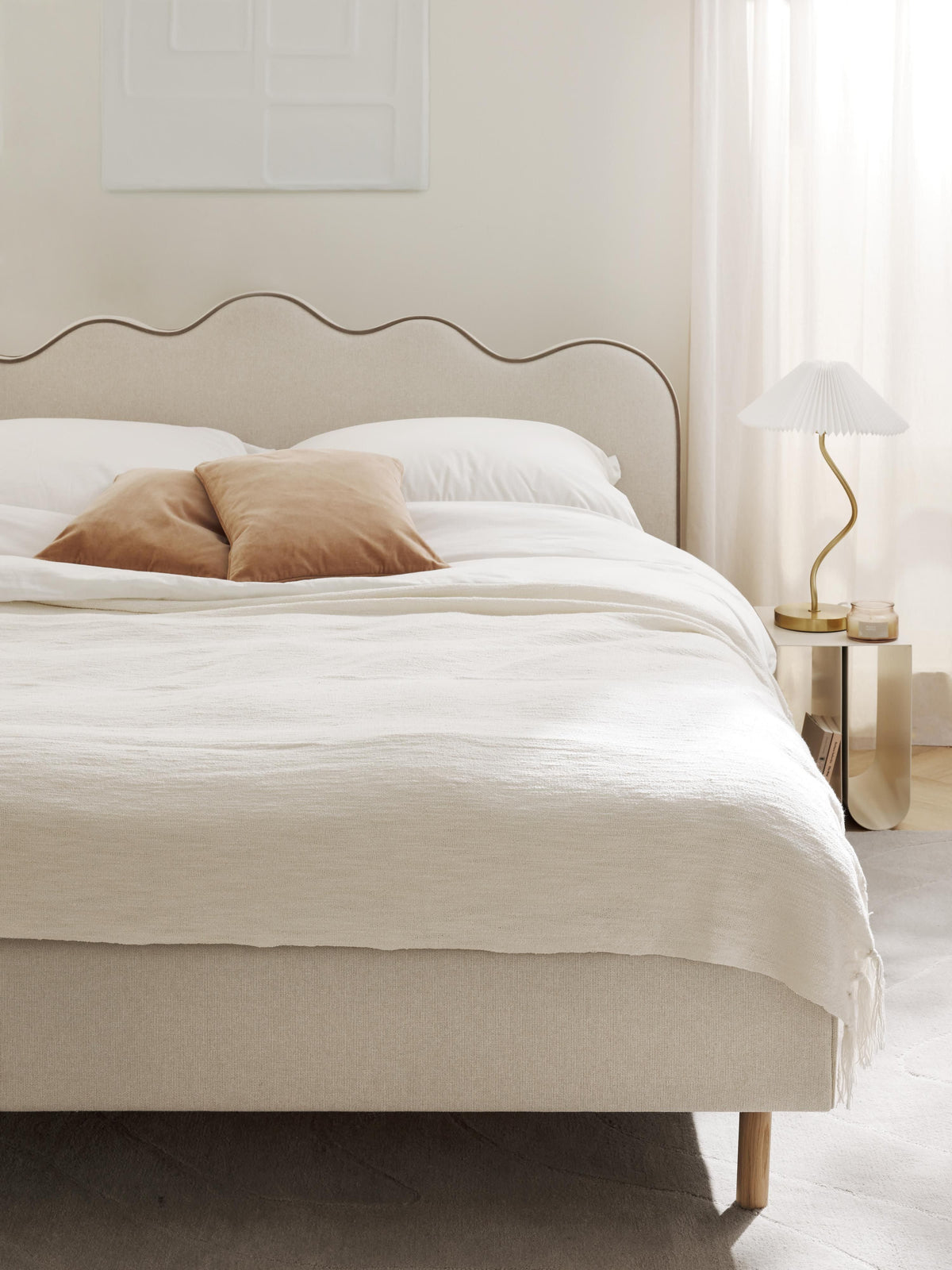 Romy Upholstered Bed with Wavy Headboard