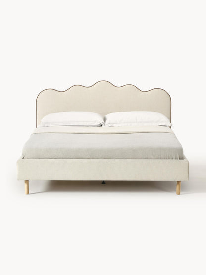 Romy Upholstered Bed with Wavy Headboard